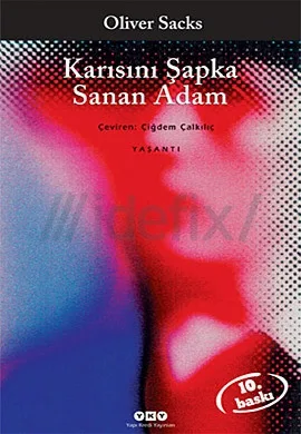 KARISINI ŞAPKA SANAN ADAM